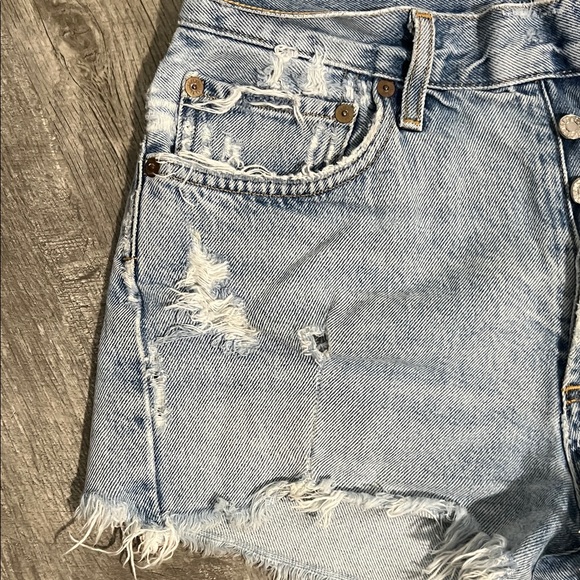 Agolde Light Wash Distressed Denim Cutoff Shorts - Picture 4 of 10